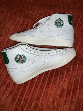 Nike White High-Top Sneakers with Green Heel Panels and Orange Stitching